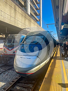 Vertical of AmtrakÃ¢â¬â¢s Acela Express unloading passengers at Union Station. ItÃ¢â¬â¢s Amtrak's